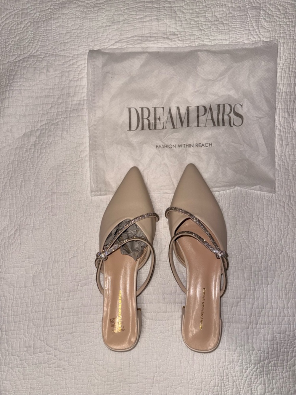 Beige and Rhinestone slip on dress shoes.